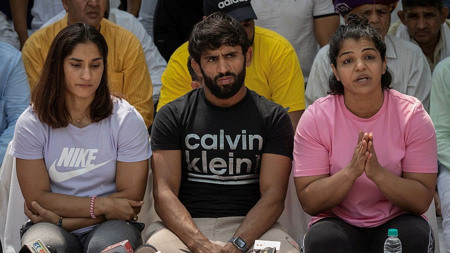 Indian wrestlers Vinesh Phogat, Bajrang Punia, and Sakshi Malik. Credit: Reuters File Photo
