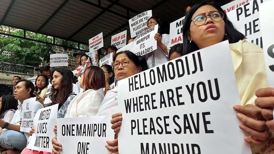 In a release, the protest organisers said Prime Minister Narendra Modi was silent even after 50 days of violence that has seen more than 100 deaths and displacement of 60,000 people. Credit: PTI Photo