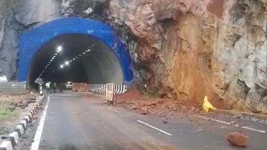 Boulders roll down the hill on to the highway near Binaga tunnel in Karwar taluk on Wednesday. Credit: DH Photo