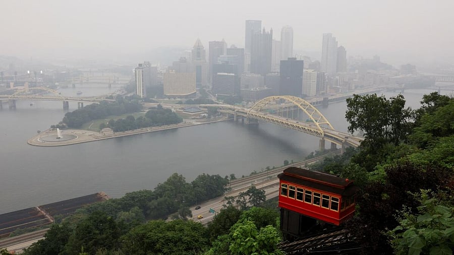 Pittsburgh's Duquesne Incline ascends Mount Washington as smoke, from Canadian wildfires, hanging over the US Midwest and parts of the East Coast create hazy skies, in Pittsburgh, Pennsylvania, US. Credit: Reuters Photo