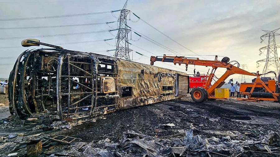 Rescue and relief work underway after a bus met with an accident and caught fire killing at least 25 passengers and injuring many othedrs on the Samruddhi Expressway in Maharashtra's Buldhana district. Credit: PTI Photo