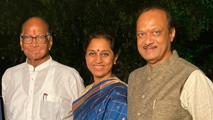 <div class="paragraphs"><p>In happy times: Sharad Pawar, Supriya Sule and Ajit Pawar.</p></div>