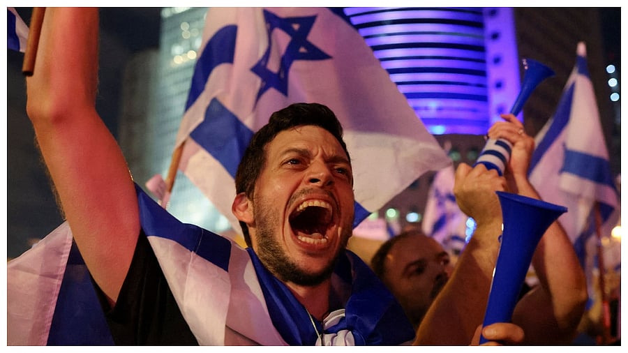 A person takes part in a demonstration against Israeli Prime Minister Benjamin Netanyahu and his nationalist coalition government's judicial overhaul, in Tel Aviv, Israel July 1, 2023. Credit: Reuters Photo