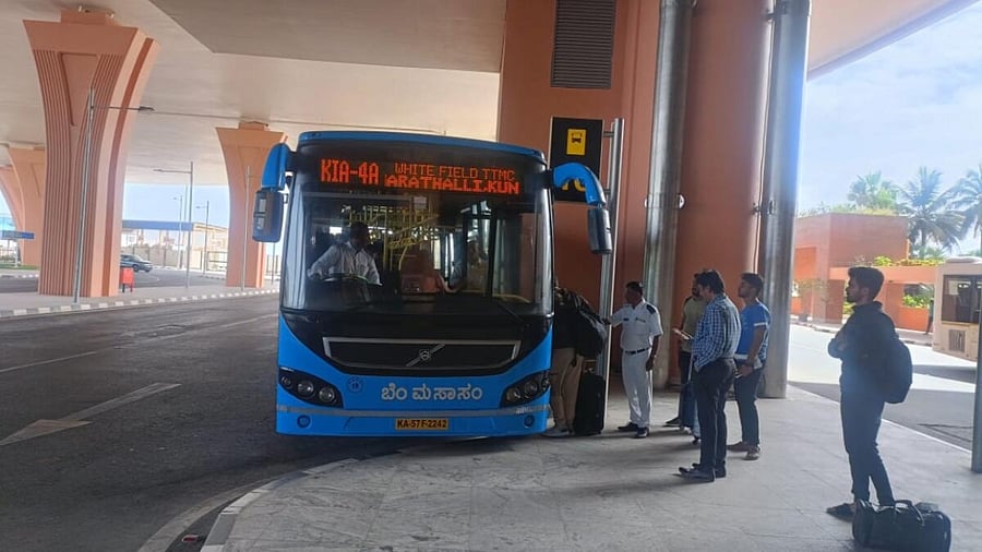 Passengers board a BMTC bus outside Terminal 2 of the Kempegowda International Airport. Credit: Special Arrangement