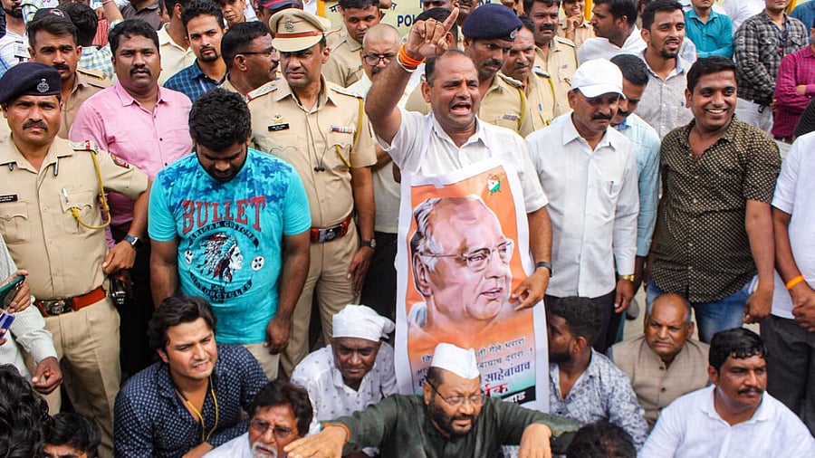 Both Ajit Pawar and Sharad Pawar groups of NCP supporters at party office, in Nashik. Credit: PTI Photo