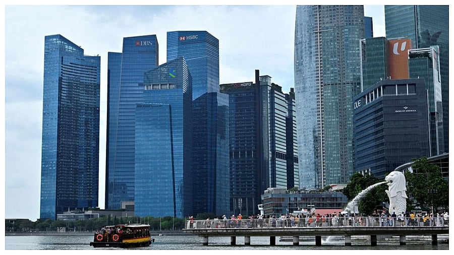 A view of the Merlion against the Singapore financial district in Singapore. Credit: Reuters Photo