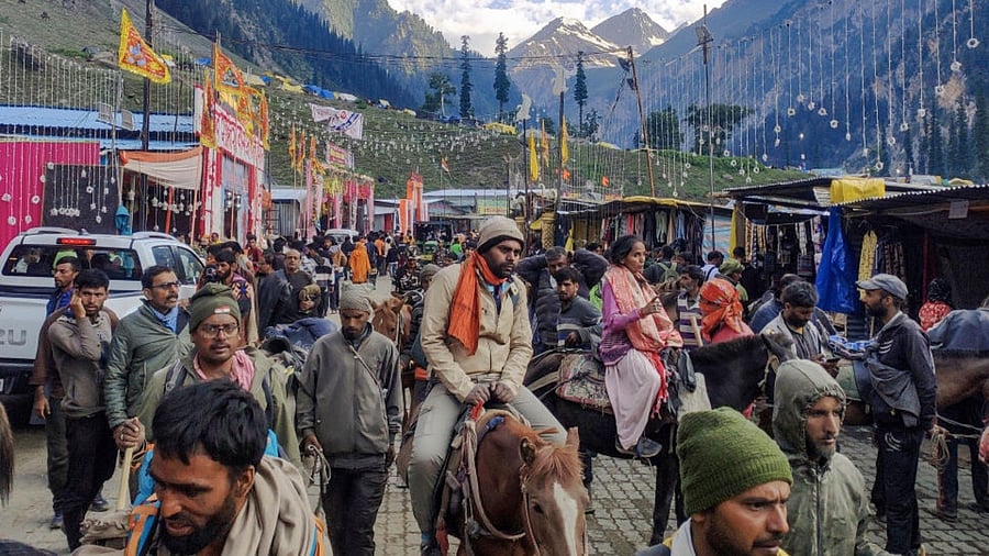 Pilgrims during the annual 'Amarnath Yatra' at Baltal base camp, in Ganderbal district, Tuesday, July 4, 2023. Credit: PTI Photo