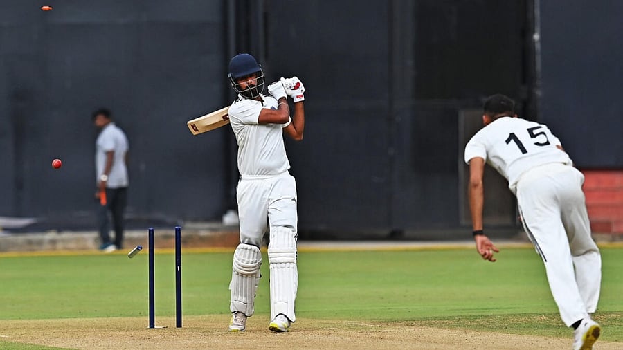 South Zone's Vidwath Kaverappa sends North Zone's Baltej Singh's middle stump cartwheeling for his fifth wicket on the first day of their Duleep Trophy semifinal at the M Chinnaswamy Stadium in Bengaluru on Wednesday. Credit: DH Photo