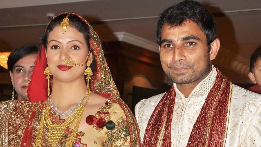 File photo of Cricketer Mohammad Shami with his wife Kolkata based model Haseen Janha after their Nikaah in Moradabad. Credit: PTI Photo