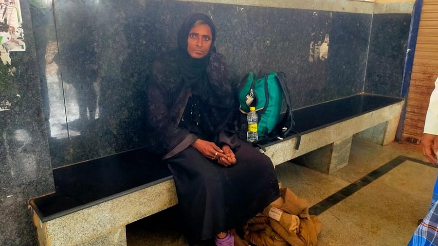 When the burqa-clad person was sitting on a bench at the bus stand, locals observed the person's man-like behaviour. Credit: Special Arrangement