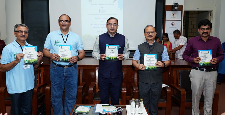 Jubilee Seminar Abstract books unveiled by dignitaries in Bengaluru on Saturday. RRI Photo