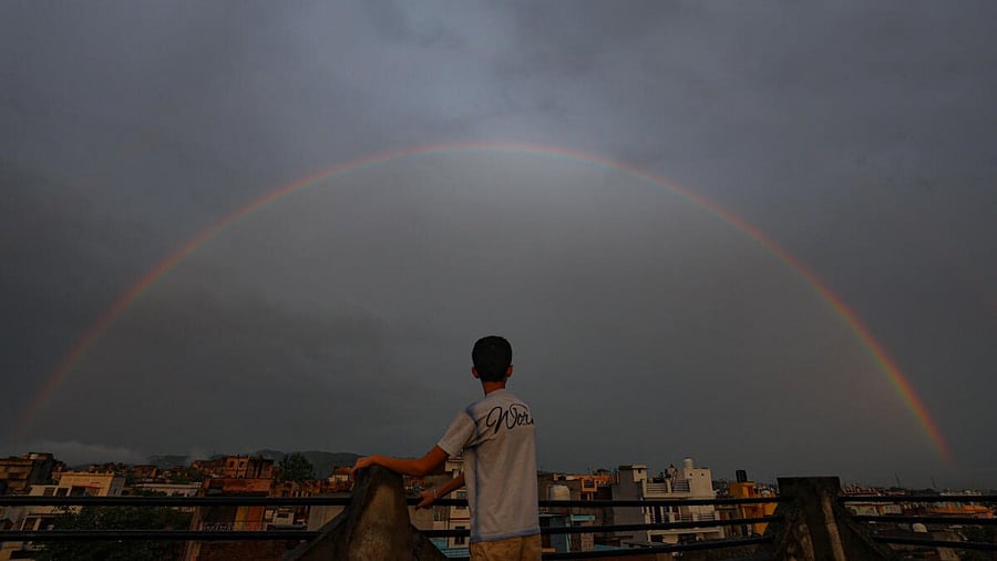 Rainbow appears after monsoon rain in Jammu, Saturday. Credit: PTI Photo