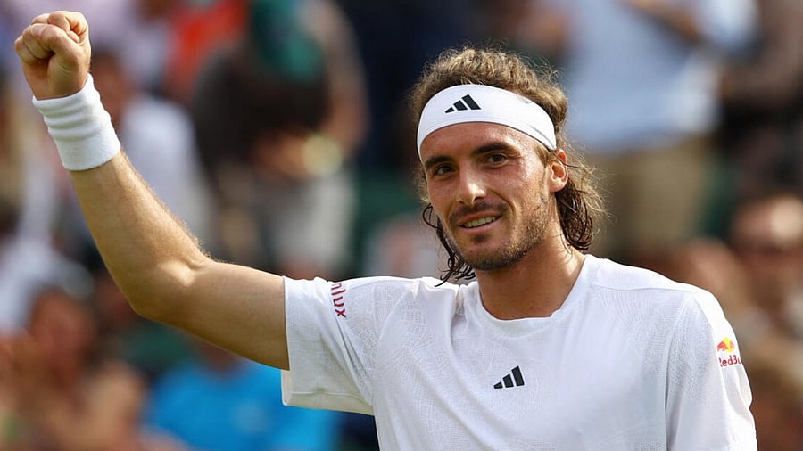 Greece's Stefanos Tsitsipas celebrates after winning his third round match against Serbia's Laslo Djere. Credit: Reuters Photo