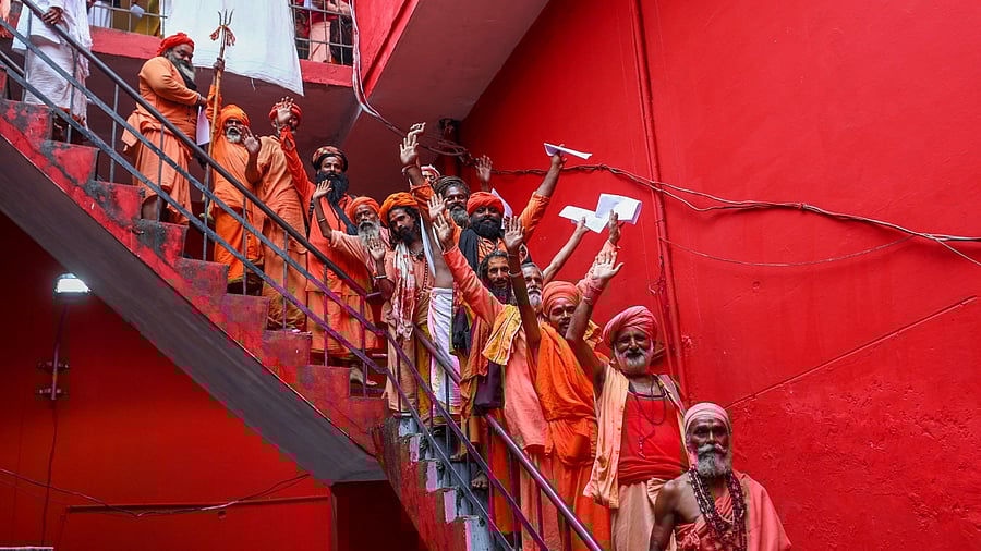 Sadhus wait to get themselves registered for the Amarnath Yatra 2023, at Ram Mandir base camp in Jammu, Sunday, July 9, 2023. Credit: PTI Photo
