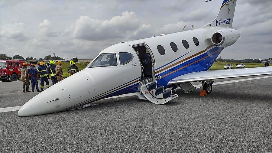  A private aircraft after it made an emergency landing due to a technical snag with its nose landing gear, at Hindustan Aeronautics Limited (HAL) airport in Bengaluru. Credit: PTI Photo