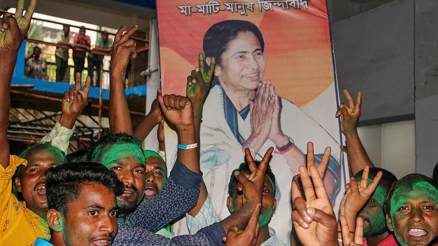 TMC workers and supporters celebrate the party's lead during the counting of votes of the West Bengal panchayat polls. Credit: PTI Photo