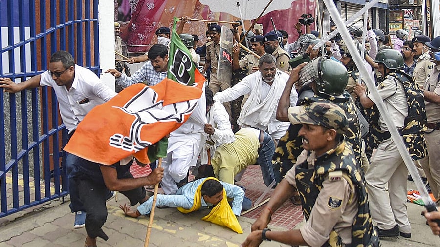 Security personnel baton charge BJP supporters during their Vidhan Sabha march in support of demands of teachers' job aspirants, in Patna. Credit: PTI Photo
