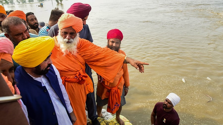Punjab Chief Minister Bhagwant Mann visits flood-affected areas, in Jalandhar, Friday, July 14, 2023. Credit: PTI Photo