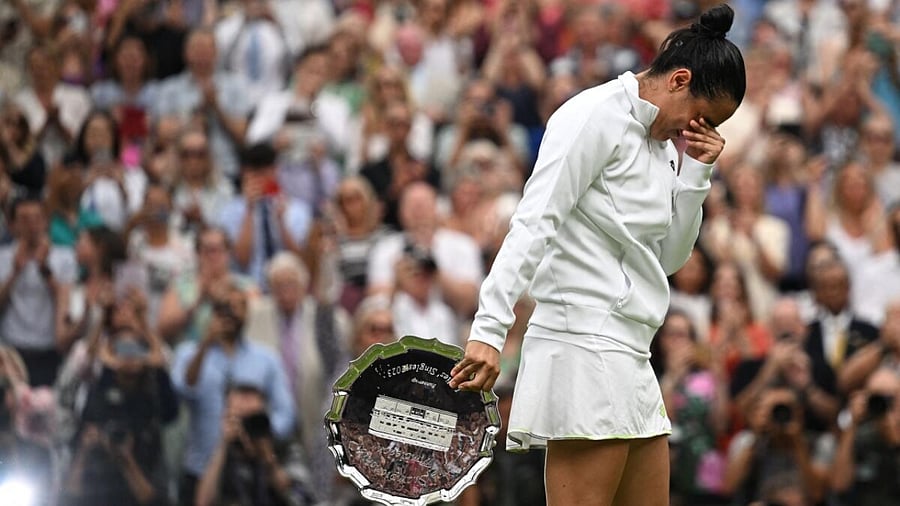 Tunisia’s Ons Jabeur with the runners up trophy after losing her final match against Czech Republic's Marketa Vondrousova. Credit: Reuters Photo