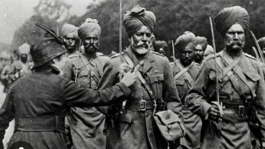 Photo of the Sikh soldiers of the Indian Expeditionary Force (IEF) marching on the Avenue des Champs-Élysées in Paris on Bastille Day on July 14, 1916. Credit: Twitter/@adgpi