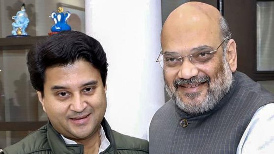 Jyotiraditya Scindia and Home Minister Amit Shah. Credit: PTI Photo