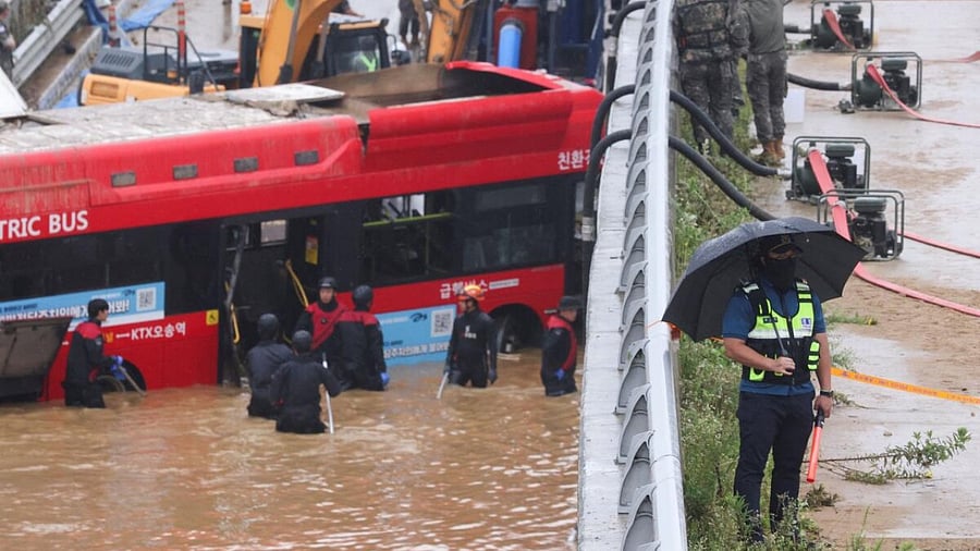 Search and rescue operation at an underpass that has been submerged by a flooded river caused by torrential rain in Cheongju. Credit: Reuters Photo