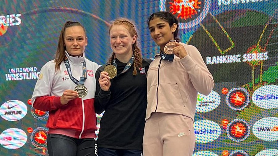 India's Sangeeta Phogat (R) poses for photographs after winning the bronze medal at the Budapest Ranking Series 2023 tournament. Credit: PTI Photo