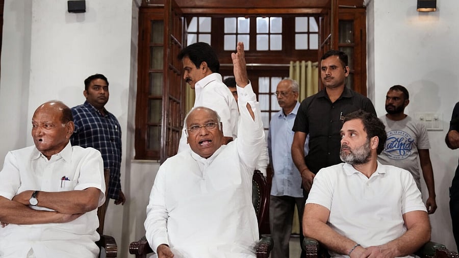 NCP Chief Sharad Pawar, Congress President Mallikarjun Kharge, and Congress leader Rahul Gandhi. Credit: PTI Photo