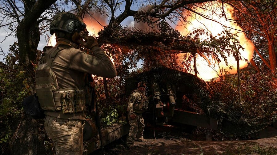 Ukrainian servicemen fire a D-20 howitzer towards Russian troops at a position near the front line town of Bakhmut. Credit: Reuters Photo