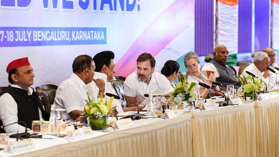 (L-R) Samajwadi Party (SP) chief Akhilesh Yadav, Dravida Munnetra Kazhagam (DMK) Leader TR Baalu, Tamil Nadu Chief Minister MK Stalin, Congress party leader Rahul Gandhi, West Bengal Chief Minister Mamata Banerjee, Congress party leader Sonia Gandhi, party President Mallikarjun Kharge, Bihar Chief Minister Nitish Kumar and Nationalist Congress Party chief Sharad Pawar during opposition parties' meet, in Bengaluru, Tuesday, July 18, 2023. Credit: PTI Photo