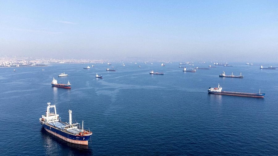 Commercial vessels including vessels which are part of Black Sea grain deal wait to pass the Bosphorus strait off the shores of Yenikapi during a misty morning in Istanbul, Turkey, October 31, 2022.  Credit: Reuters Photo