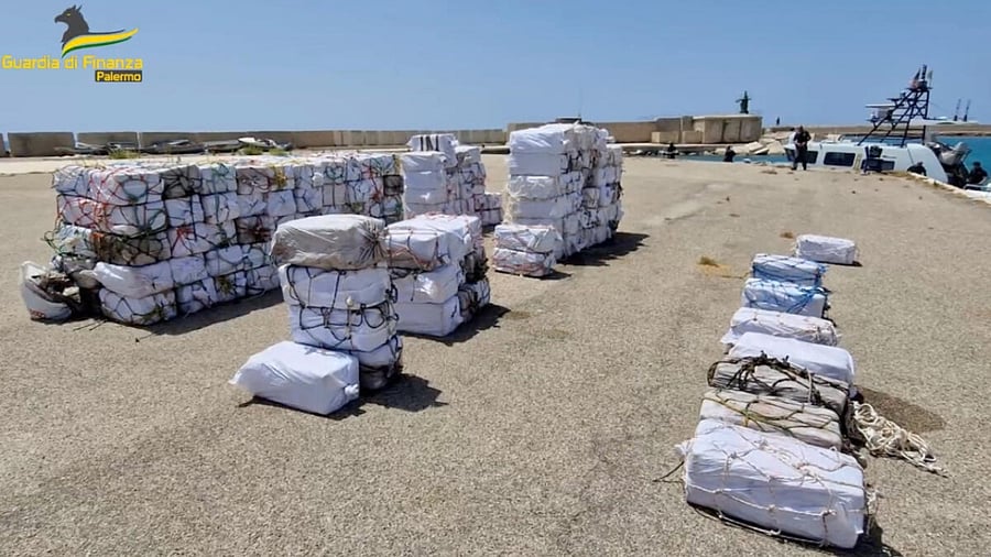 Packages containing cocaine seized during a police operation, lie on a dock in the harbour of Porto Empedocle, Italy. Credit: Reuters Photo