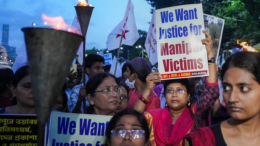 Activists of SFI, DYFI and AIDWA participate in a rally to protest against Manipur's ongoing ethnic violence, in Kolkata, Saturday, July 22, 2023. Credit: PTI Photo