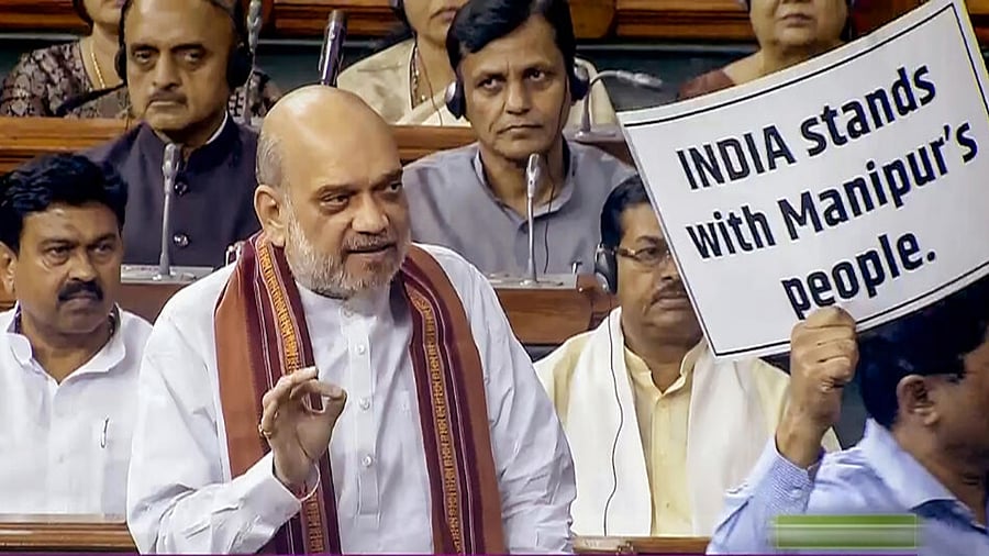  Union Home Minister Amit Shah speaks in the Lok Sabha during the Monsoon session of Parliament. Credit: PTI Photo