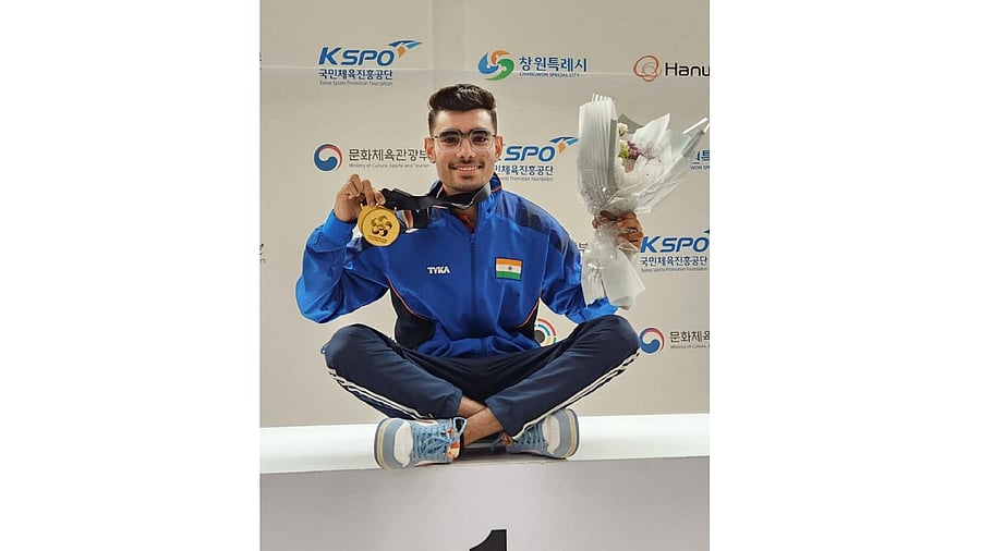 India's Kamaljeet poses for photos after winning the gold medal in men's 50m Pistol event at the ISSF Junior World Championship, in Changwon, South Korea. Credit: PTI Photo