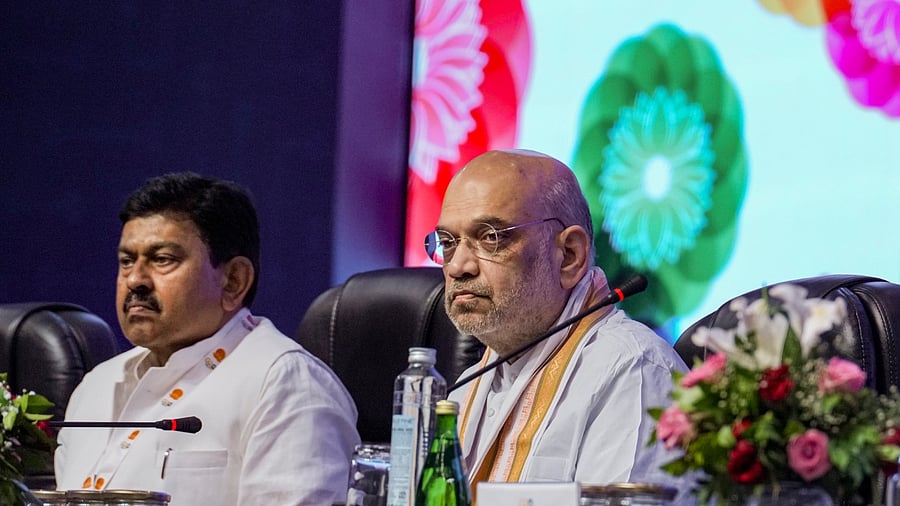 Union Minister of State for Home Ajay Kumar Mishra and Home Minister Amit Shah. Credit: PTI Photo