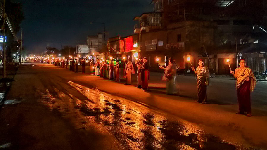 Women form a human chain to protest against the ethnic violence between Meitei and Kuki community people in Manipur. Credit: PTI File Photo