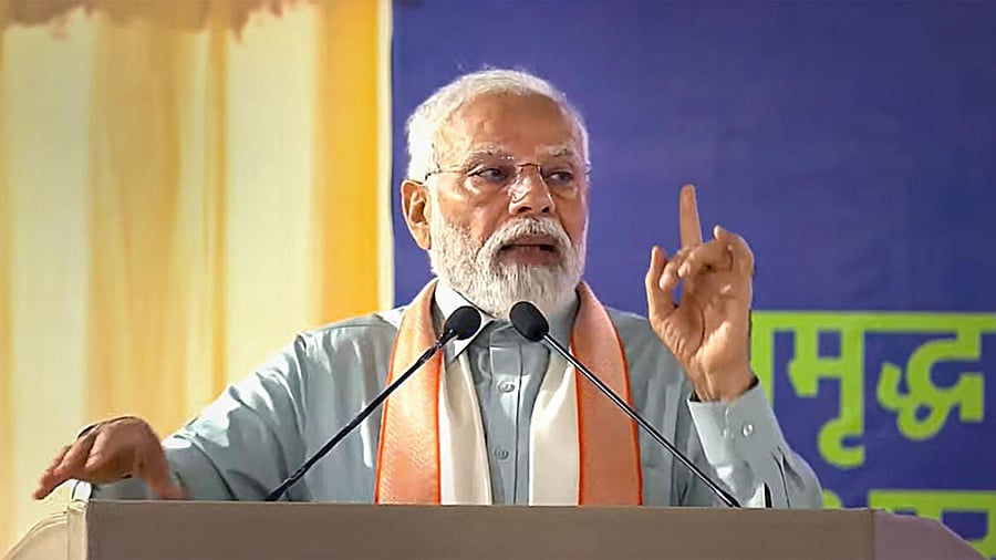 PM Modi addresses a gathering in Sikar. Credit: PTI Photo