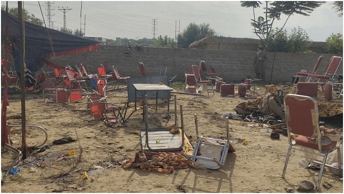 A general view of damaged property, following an explosion by a suicide bomber in Bajaur, Pakistan July 31, 2023 in this screen grab taken from a social media video. Credit: Bilal Yasir/via Reuters