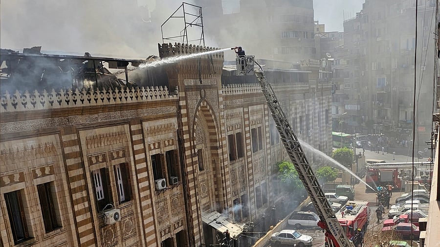 Egyptian firefighters extinguish a fire that broke out in the historic neo-Islamic ministry in central Cairo, Egypt, August 5, 2023. Credit: Reuters Photo