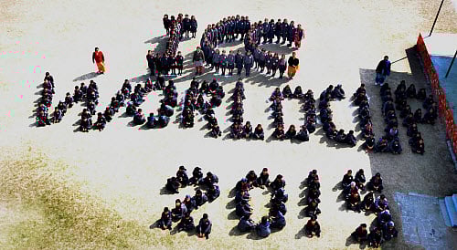 Amritsar: School students make a human chain that reads ICC World CUP 2015 ahead of its start in Australia, in Amritsar on Thursday. PTI Photo