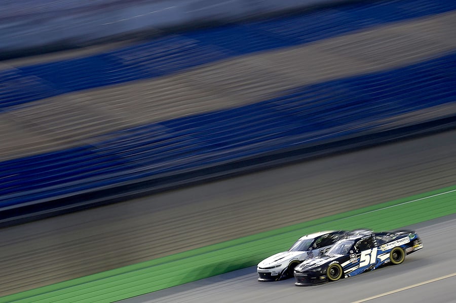 Jeremy Clements, driver of the #51 First Pacific Funding Chevrolet, drives during the NASCAR Xfinity Series Alsco 300 at Kentucky Speedway. Credits: AFP Photo