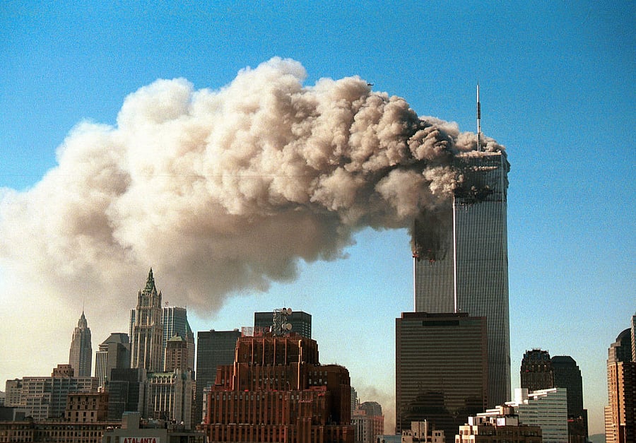 Smoke pours from the twin towers of the World Trade Center after they were hit by two hijacked airliners in a terrorist attack September 11, 2001 in New York City. Credit: Getty Images