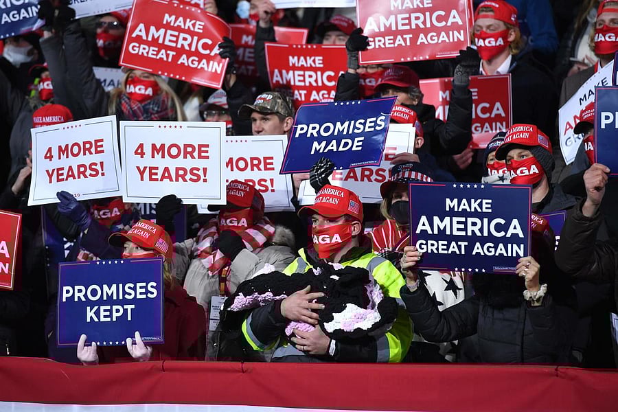 Supporters watch as US President Donald Trump speaks during a during a rally at Williamsport Regional Airport in Montoursville, Pennsylvania. Credit: AFP Photo