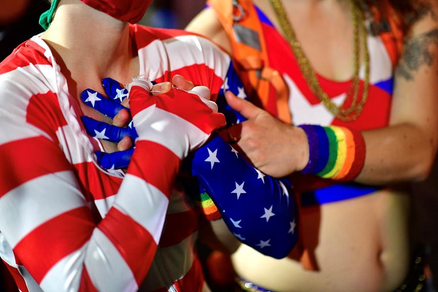 Activists react during a speech about ousting US President Donald Trump on a street, as votes continue to be counted following the presidential election, in Philadelphia, Pennsylvania. Credit: Reuters Photo