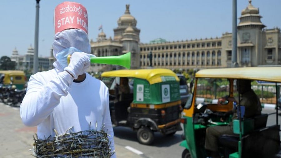 In Pics | A year on, India battles fresh wave of curfews, curbs