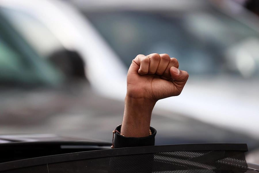 A person reacts after the verdict was read in the Derek Chauvin trial. Credit: AFP photo. 