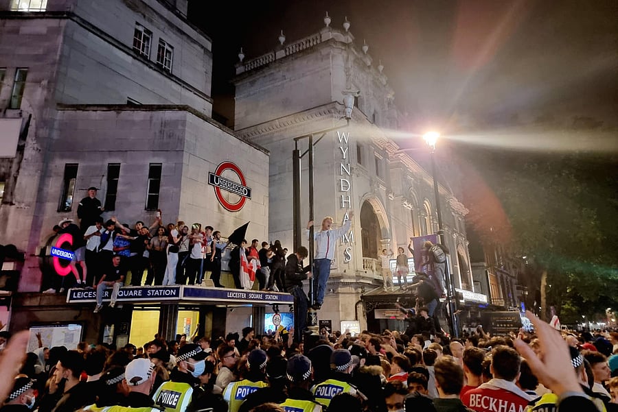 Fans celebrate after the match between England and Denmark. All the years of hurt, England fans sing about it. All that sense of entitlement, rival fans are irritated by it. Credit: Reuters Photo 