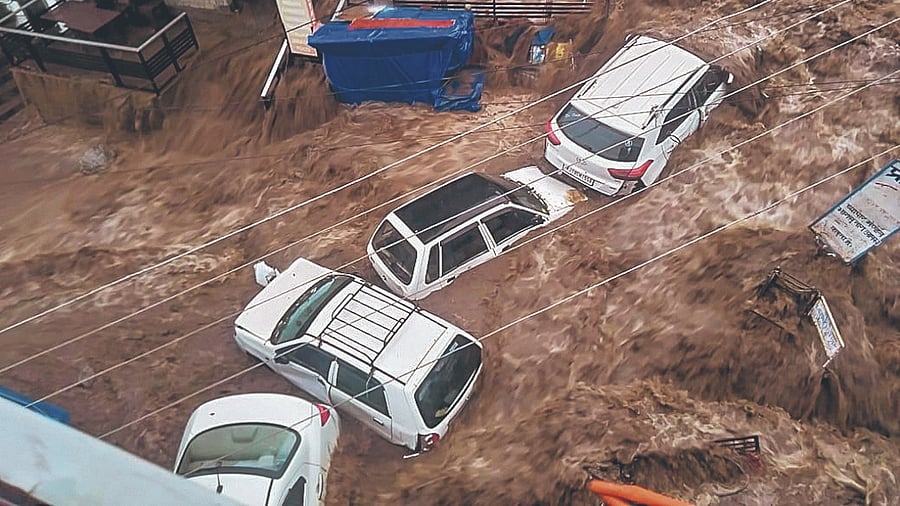 In Pics | Cars, buildings swept away as heavy rains trigger flash floods in Himachal's Dharamshala