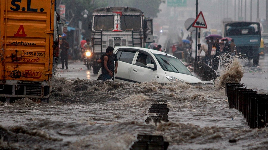 Heavy rains wreak havoc in Delhi, normal life paralysed; See pics